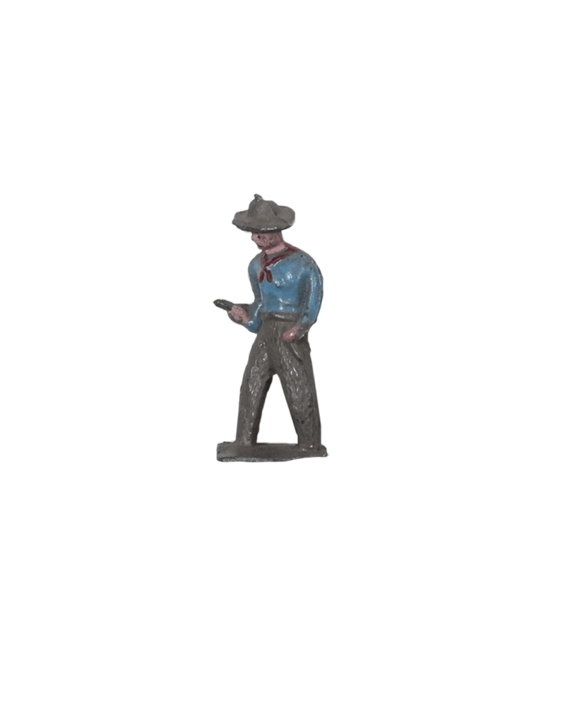 BARCLAY FIGURE OF COWBOY WITH BLUE SHIRT