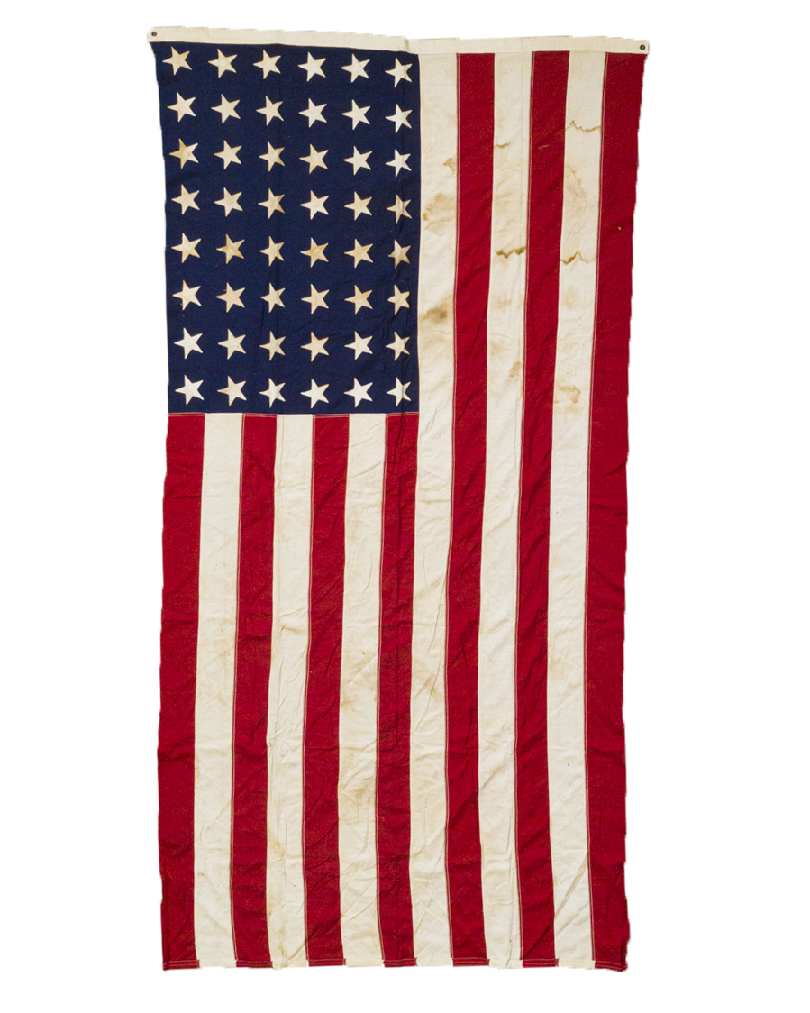 A LOVELY LARGE 48 STAR US FLAG (STAINED)