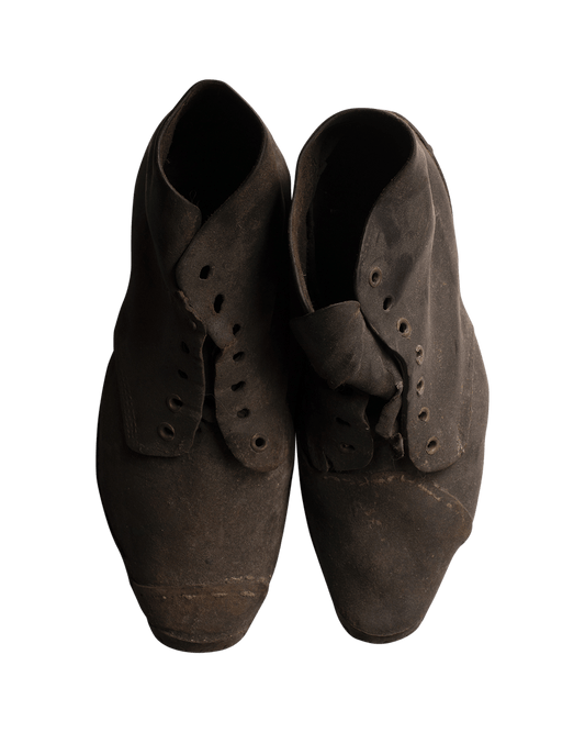 A Late 1800s Workers Clogs Display