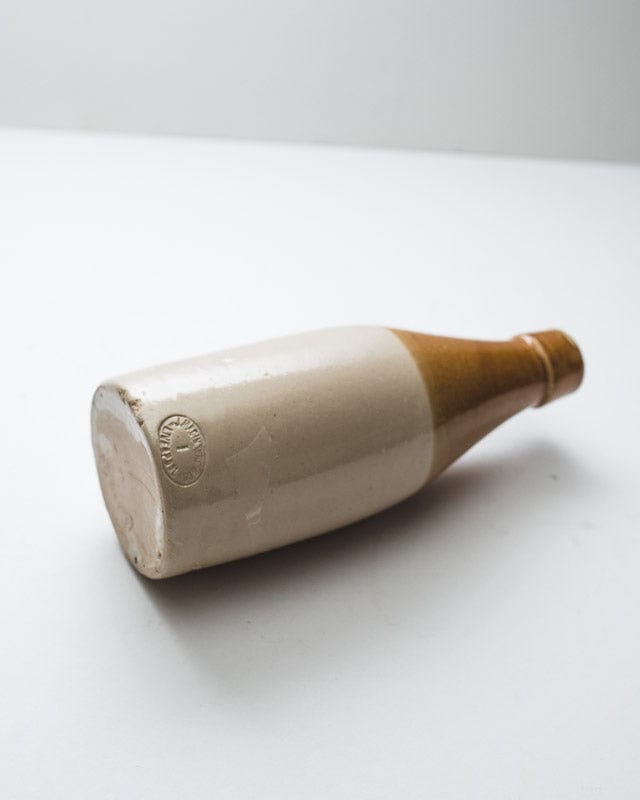 ANTIQUE J. MACINTYRE & CO CLAY ROUND BOTTLE