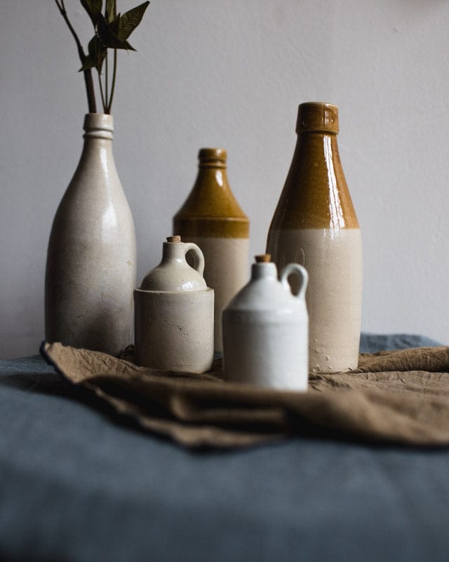 ANTIQUE J. MACINTYRE & CO CLAY ROUND BOTTLE