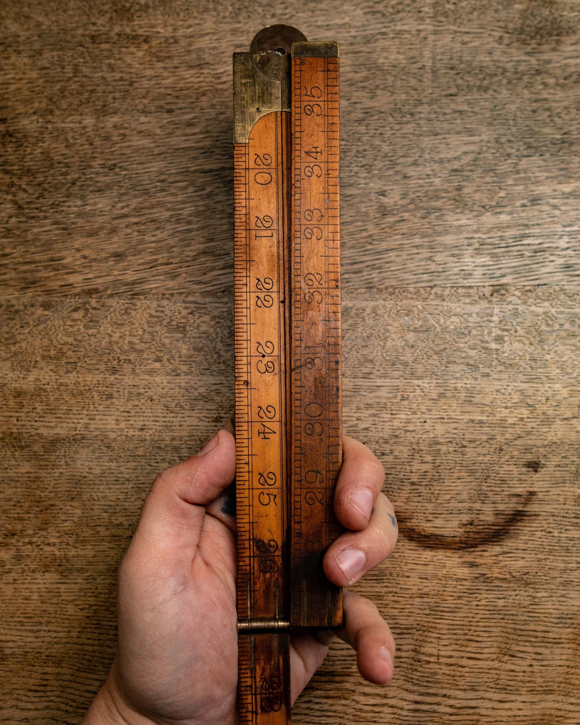 Boxwood folding ruler with brass tips