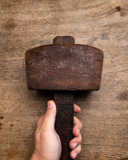 Old wood carpenter mallet