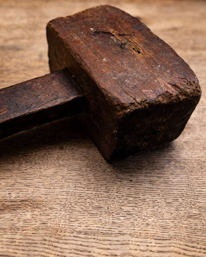 Old wood carpenter mallet