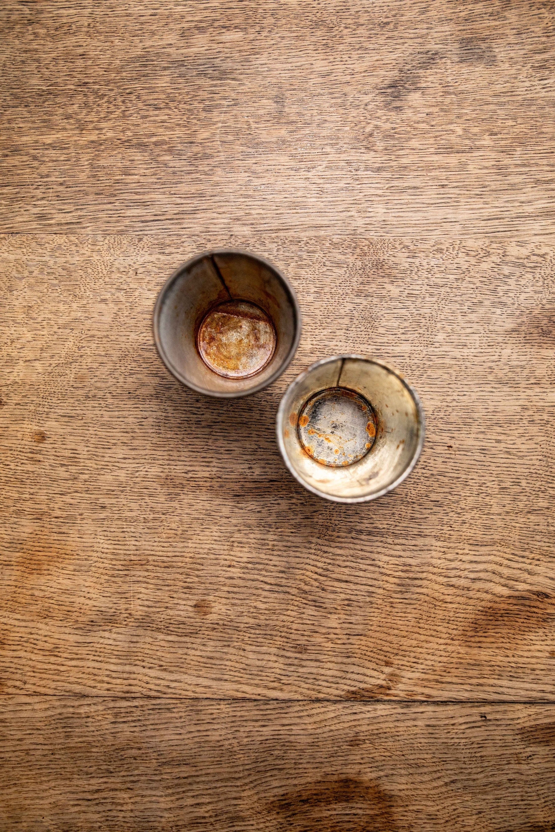 Pair of slightly rusted espresso cups