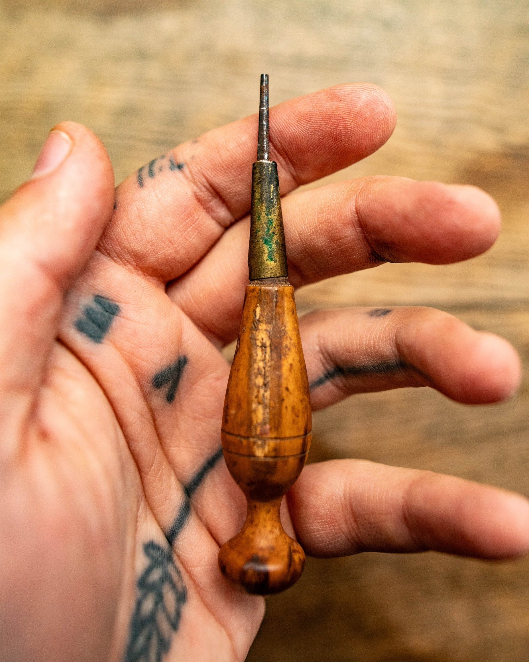 Walnut handled leather awl