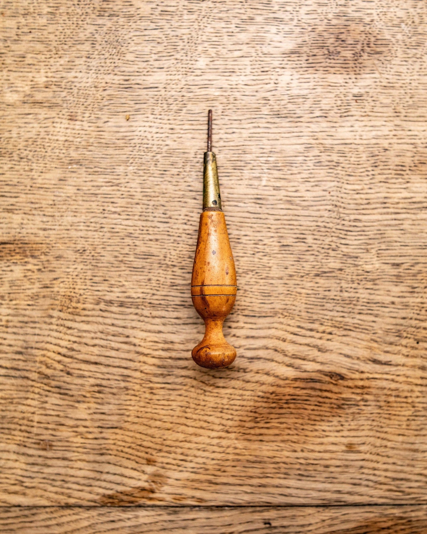 Walnut handled leather awl