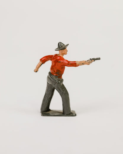 Figura de vaquero líder de la Segunda Guerra Mundial con revólver